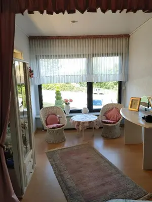 Ein Sitzbereich in der Unterkunft Sunny Hill