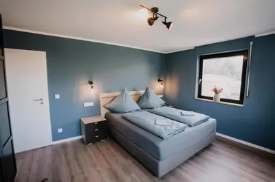 Ein Bett oder Betten in einem Zimmer der Unterkunft Ruhiges Soonwald Cottage