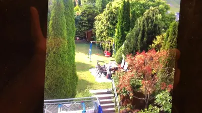 Ein Garten an der Unterkunft gemütliches Zimmer in Winningen mit Garten-, Küchennutzung und Arbeitsplatz