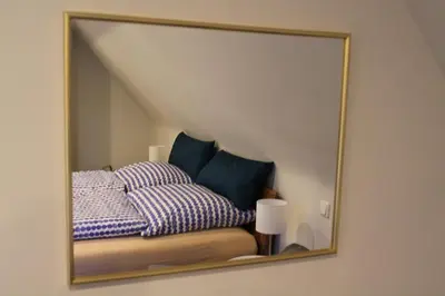 Ein Bett oder Betten in einem Zimmer der Unterkunft Kleine Auszeit, schöne Ferienwohnung