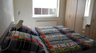 Ein Bett oder Betten in einem Zimmer der Unterkunft Am Reichelbach schöne Natur kostenlose Stellplätze