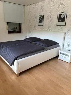 Ein Bett oder Betten in einem Zimmer der Unterkunft Ferienwohnung Wahlich