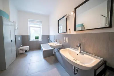 Ein Badezimmer in der Unterkunft DQ01 - Monteurwohnung - WLAN - 5 Personen