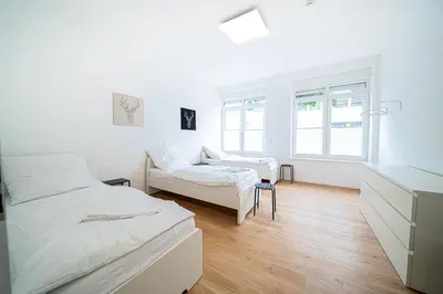 Ein Bett oder Betten in einem Zimmer der Unterkunft DQ01 - Monteurwohnung - WLAN - 5 Personen