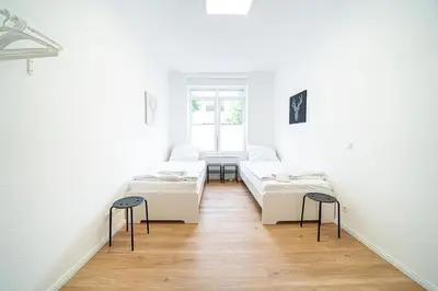 Ein Bett oder Betten in einem Zimmer der Unterkunft DQ01 - Monteurwohnung - WLAN - 5 Personen