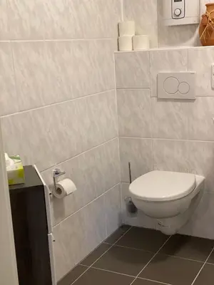 Ein Badezimmer in der Unterkunft Rezas Restaurant Gästehaus