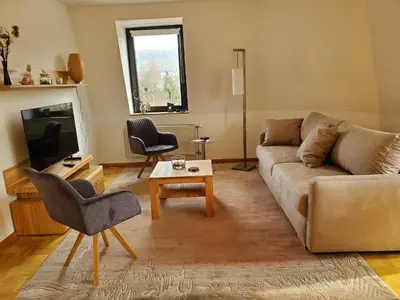 Ein Sitzbereich in der Unterkunft Komfort FeWo Stadt Mitte