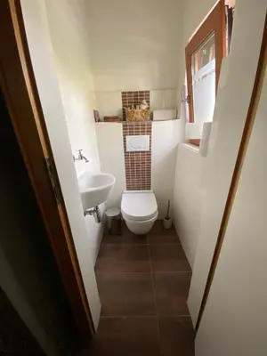 Ein Badezimmer in der Unterkunft Megina Lodge