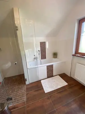 Ein Badezimmer in der Unterkunft Megina Lodge