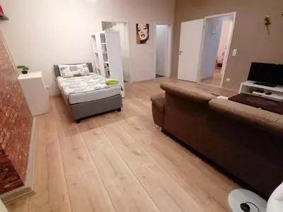 Ein Bett oder Betten in einem Zimmer der Unterkunft Ferienwohnung in Mayen