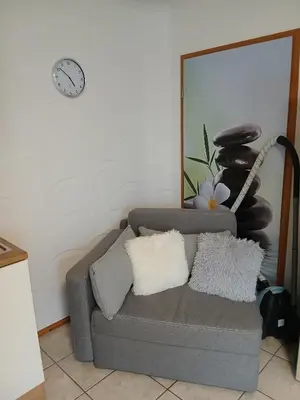Ein Sitzbereich in der Unterkunft Ferienwohnung May
