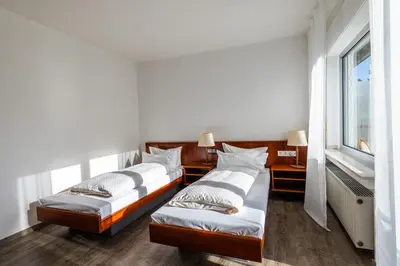 Ein Bett oder Betten in einem Zimmer der Unterkunft Haus Koinonia