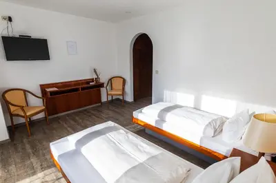 Ein Bett oder Betten in einem Zimmer der Unterkunft Haus Koinonia