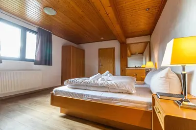 Ein Bett oder Betten in einem Zimmer der Unterkunft Haus Koinonia
