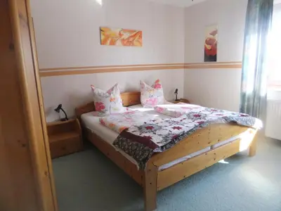 Ein Bett oder Betten in einem Zimmer der Unterkunft Ferienwohnung Hochwald