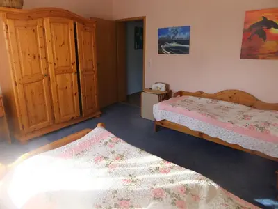 Ein Bett oder Betten in einem Zimmer der Unterkunft Ferienwohnung Hochwald