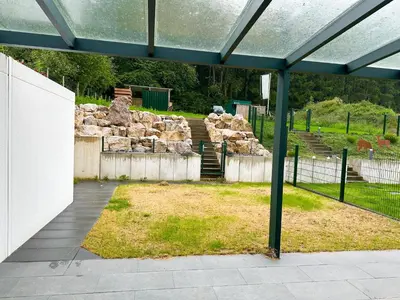 Ein Garten an der Unterkunft Traumferienhaus Leimbach am Nürburgring