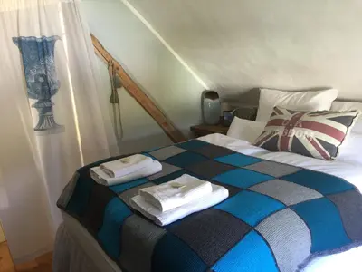 Ein Bett oder Betten in einem Zimmer der Unterkunft All Seasons Bed & Breakfast