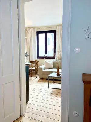 Ein Sitzbereich in der Unterkunft Historisches Apartment Minimalus