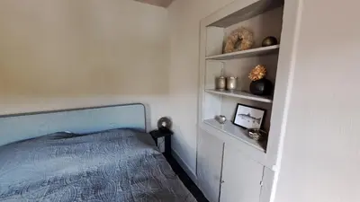 Ein Bett oder Betten in einem Zimmer der Unterkunft Ferienhaus Fridolin