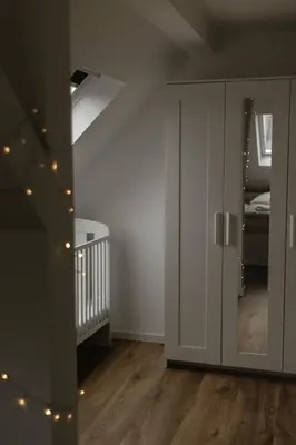 Ein Bett oder Betten in einem Zimmer der Unterkunft ZoHe Alpha Apartment mit Moselblick