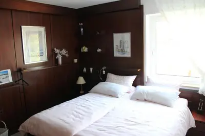 Ein Bett oder Betten in einem Zimmer der Unterkunft Ferienwohnung Stölben