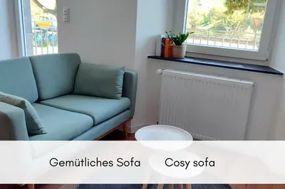 Ein Sitzbereich in der Unterkunft Winzerhaus am Calmont - Charme & Moselblick