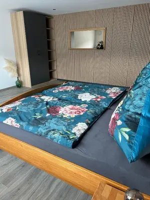 Ein Bett oder Betten in einem Zimmer der Unterkunft Ferienweingut Kappes