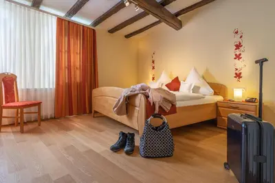 Ein Bett oder Betten in einem Zimmer der Unterkunft Ferienwohnungen Alte Gerberei