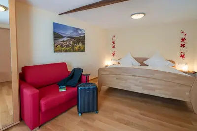 Ein Bett oder Betten in einem Zimmer der Unterkunft Ferienwohnungen Alte Gerberei