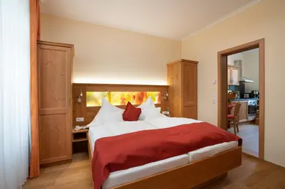 Ein Bett oder Betten in einem Zimmer der Unterkunft Ferienwohnungen Engelmannstift