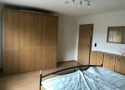 Ein Bett oder Betten in einem Zimmer der Unterkunft Am Mühlenberg