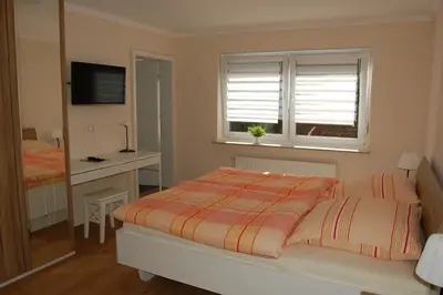 Ein Bett oder Betten in einem Zimmer der Unterkunft Ferienhaus Mosel Bub