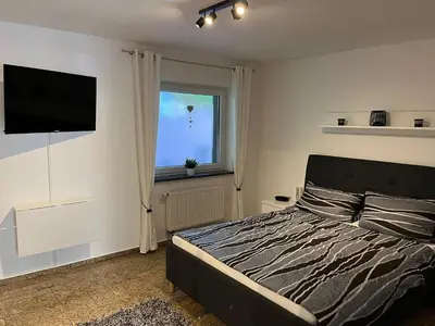 Ein Bett oder Betten in einem Zimmer der Unterkunft Ferienwohnung Mara