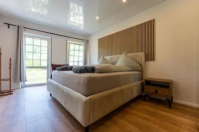 Ein Bett oder Betten in einem Zimmer der Unterkunft Moselresidenz Bellevue Alf