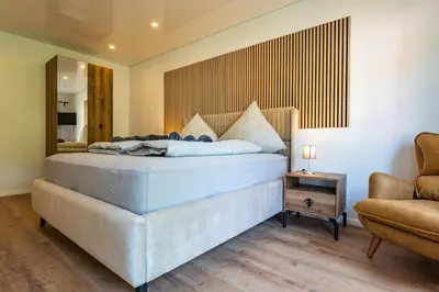 Ein Bett oder Betten in einem Zimmer der Unterkunft Moselresidenz Bellevue Alf