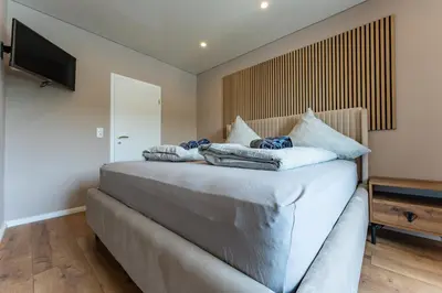 Ein Bett oder Betten in einem Zimmer der Unterkunft Moselresidenz Bellevue Alf