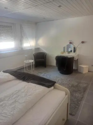 Ein Bett oder Betten in einem Zimmer der Unterkunft Riesling