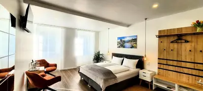 Ein Bett oder Betten in einem Zimmer der Unterkunft MoselVilla No 7