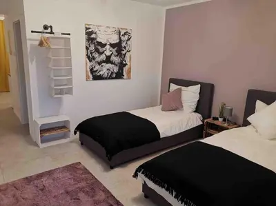 Ein Bett oder Betten in einem Zimmer der Unterkunft RheinMosel Glück 5