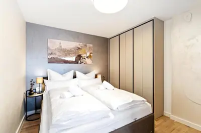 Ein Bett oder Betten in einem Zimmer der Unterkunft Modern Elegance in historical City Center