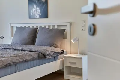 Ein Bett oder Betten in einem Zimmer der Unterkunft Mosel Panorama