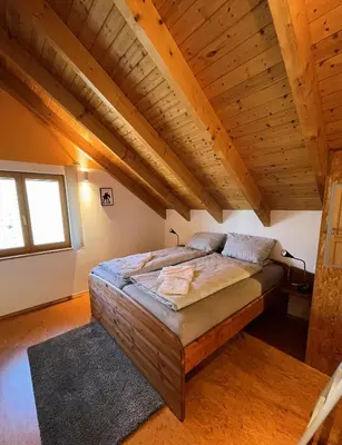 Ein Bett oder Betten in einem Zimmer der Unterkunft Deti's Ferienwohnung