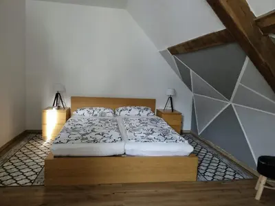 Ein Bett oder Betten in einem Zimmer der Unterkunft Karima Ferienhaus