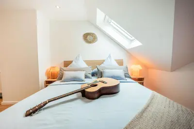 Ein Bett oder Betten in einem Zimmer der Unterkunft A Hidden Gem in the Heart of Koblenz