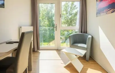 Ein Sitzbereich in der Unterkunft B - HOME Apartments