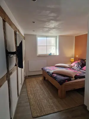 Ein Bett oder Betten in einem Zimmer der Unterkunft RawertsRefugium