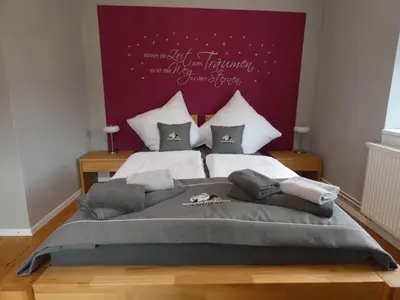 Ein Bett oder Betten in einem Zimmer der Unterkunft Neuendorf Hillside Haven