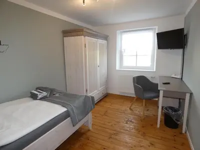 Ein Bett oder Betten in einem Zimmer der Unterkunft Neuendorf Hillside Haven