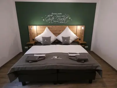 Ein Bett oder Betten in einem Zimmer der Unterkunft Neuendorf Hillside Haven
